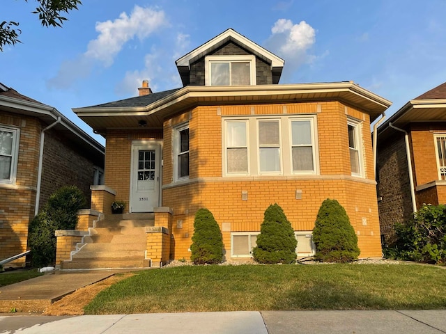 view of front facade featuring a front yard