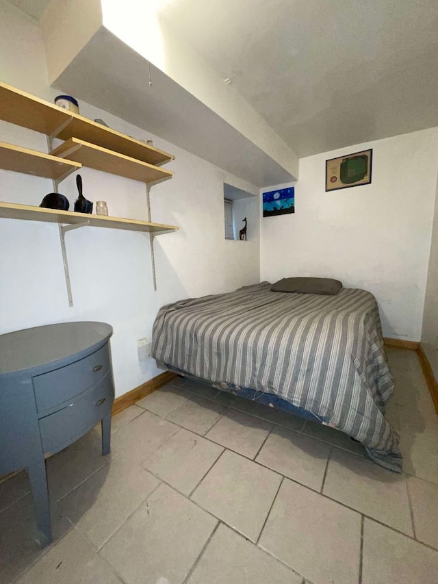 bedroom featuring tile patterned floors