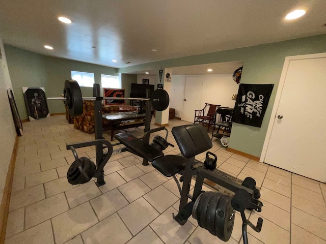 workout room with light tile patterned floors