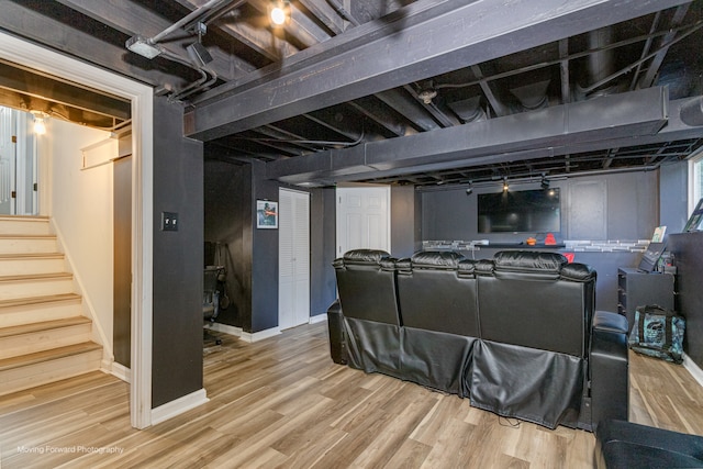 basement featuring wood-type flooring