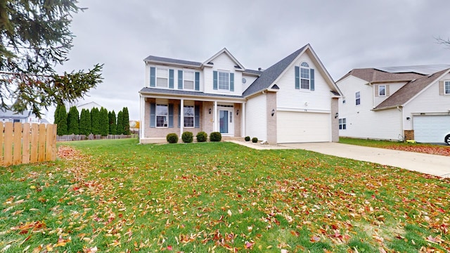 view of front of home featuring a front yard and covered porch