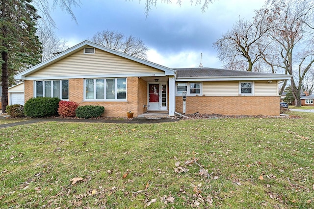 ranch-style home with a front lawn