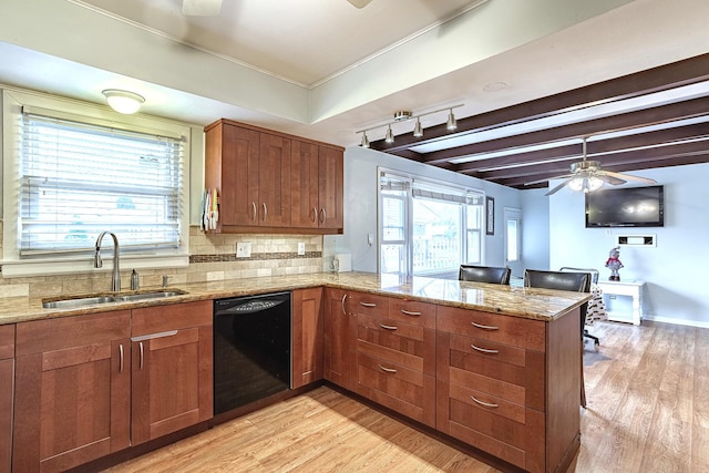 kitchen with beam ceiling, sink, black dishwasher, tasteful backsplash, and kitchen peninsula