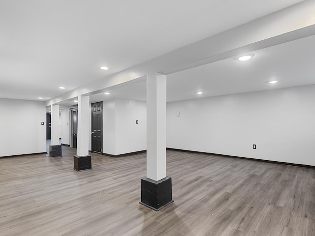 basement with light wood-type flooring