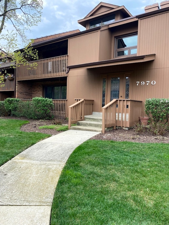 exterior space with a front yard