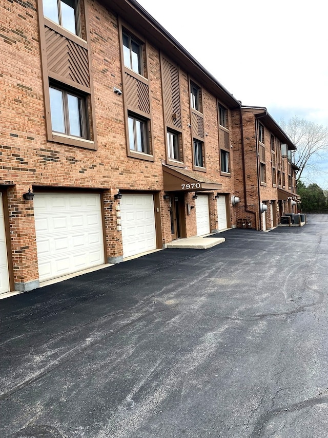 view of building exterior with a garage