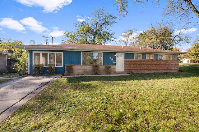 ranch-style house with a front yard