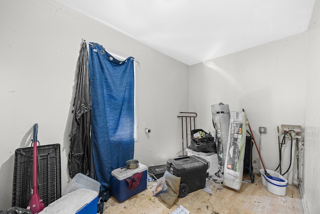 miscellaneous room with hardwood / wood-style flooring