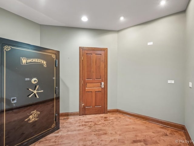 hall featuring wood-type flooring
