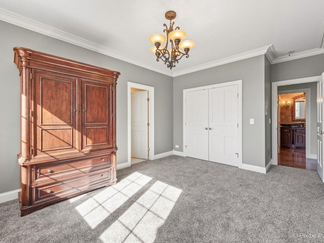 239 Indian Trail Rd, North Barrington, IL 60010 - unfurnished bedroom with carpet, a chandelier, baseboards, ornamental molding, and a closet