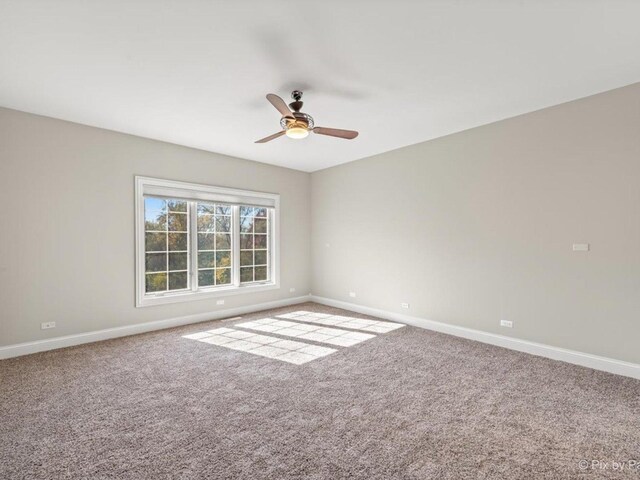 239 Indian Trail Rd, North Barrington, IL 60010 - unfurnished room featuring baseboards, carpet, and ceiling fan