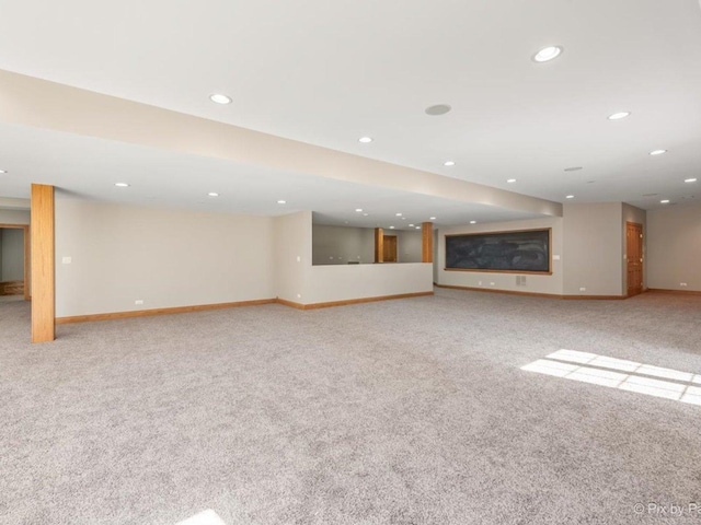 239 Indian Trail Rd, North Barrington, IL 60010 - unfurnished living room with carpet, baseboards, and recessed lighting
