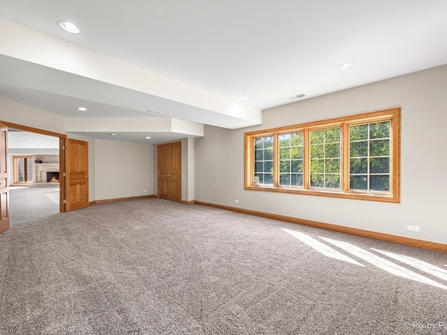 unfurnished room featuring carpet flooring