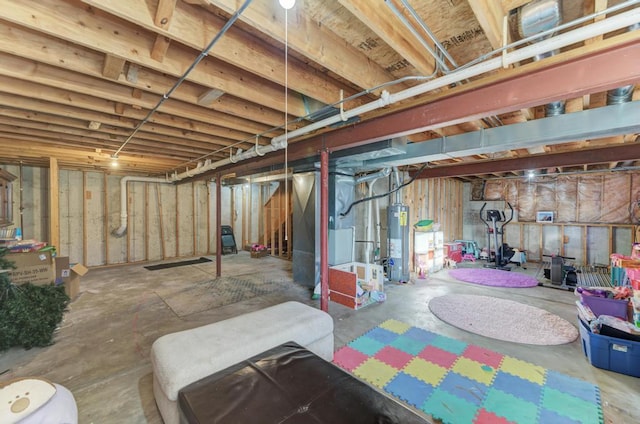 basement featuring water heater and heating unit