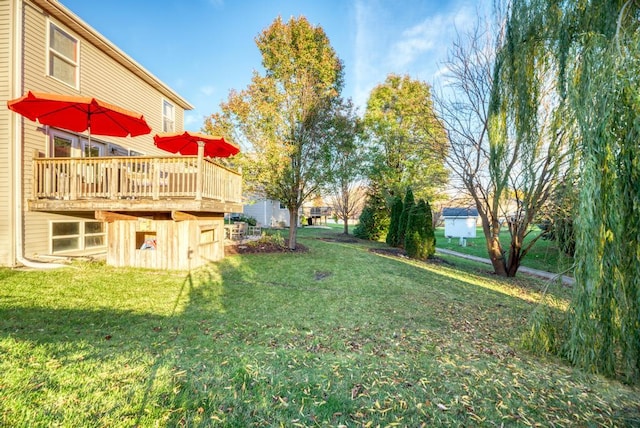 view of yard with a deck