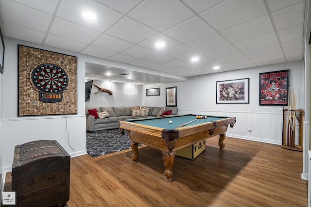 game room with wood finished floors, billiards, and a drop ceiling
