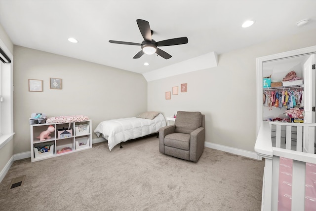 carpeted bedroom with ceiling fan