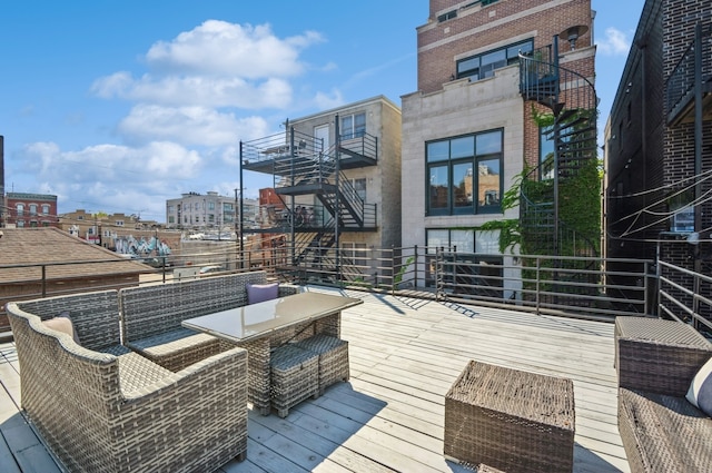 wooden deck with an outdoor hangout area