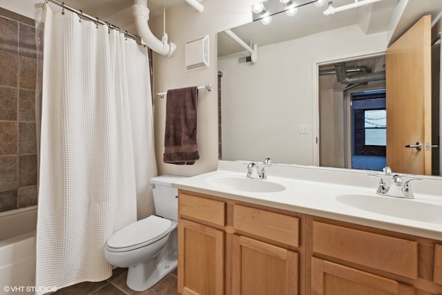 full bathroom with vanity, toilet, tile patterned floors, and shower / bath combo with shower curtain