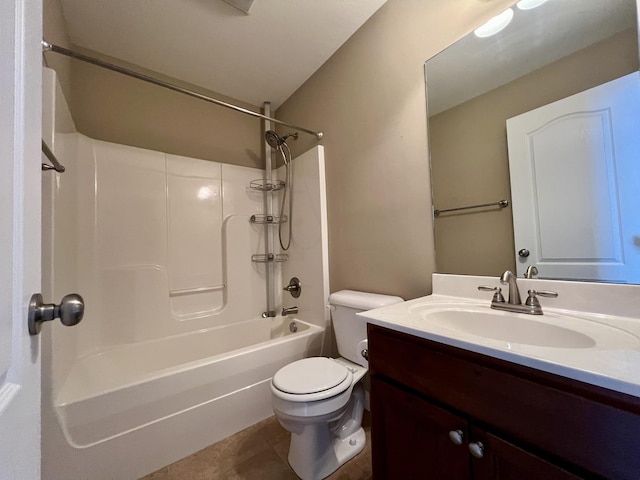 full bathroom with tile patterned flooring, vanity, bathing tub / shower combination, and toilet