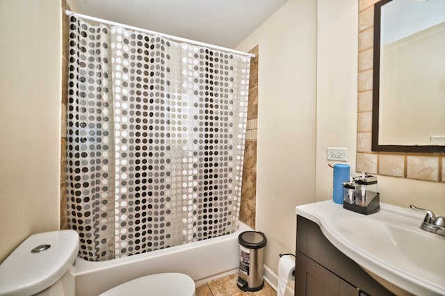 full bathroom featuring vanity, shower / bath combination with curtain, toilet, and tile patterned floors