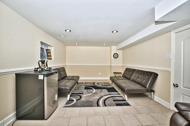 living area featuring light tile patterned floors