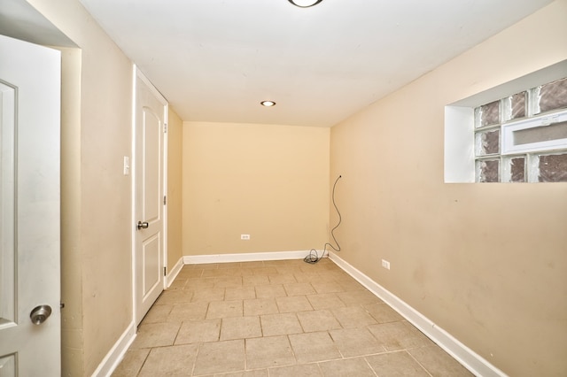 washroom with light tile patterned floors