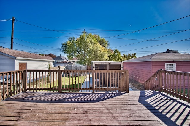 deck featuring a yard