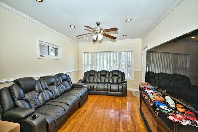 living room with ceiling fan, crown molding, and hardwood / wood-style floors