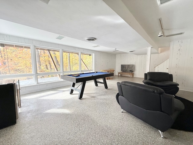 game room with wood walls, billiards, and carpet floors