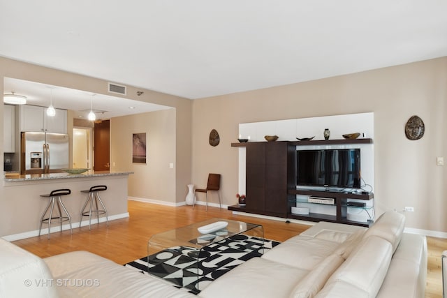 living room featuring light wood-type flooring