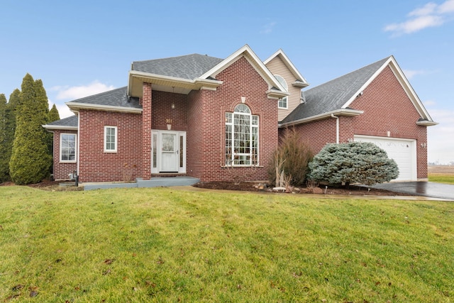 front of property with a garage and a front lawn