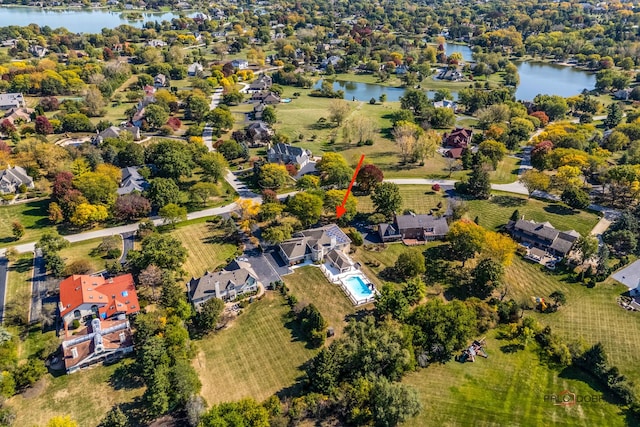 bird's eye view with a water view