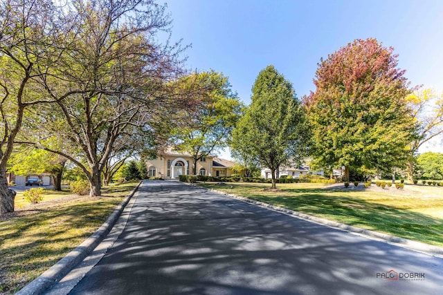 exterior space featuring a front lawn