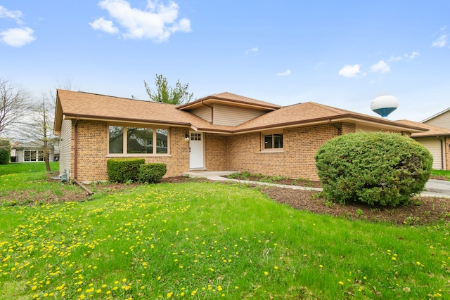 view of front of property with a front lawn