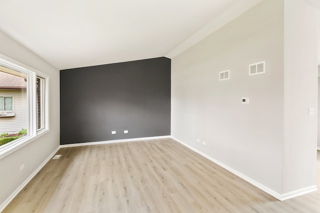 empty room with light wood-type flooring