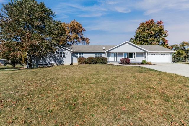 15054 E 2500 N Rd, Hudson, IL 61748 - single story home featuring an attached garage, covered porch, a front yard, and concrete driveway