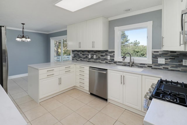 15054 E 2500 N Rd, Hudson, IL 61748 - kitchen with stainless steel appliances, a sink, backsplash, light countertops, and ornamental molding