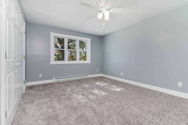 empty room featuring carpet, a baseboard radiator, and ceiling fan