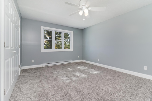 15054 E 2500 N Rd, Hudson, IL 61748 - empty room with a baseboard radiator, carpet floors, a ceiling fan, and baseboards