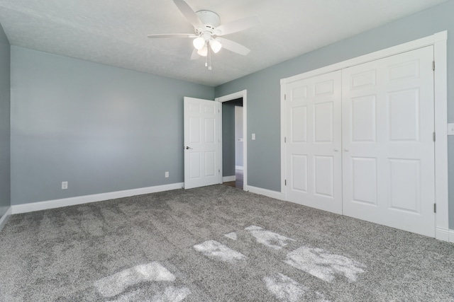 unfurnished bedroom featuring a closet, carpet floors, and ceiling fan