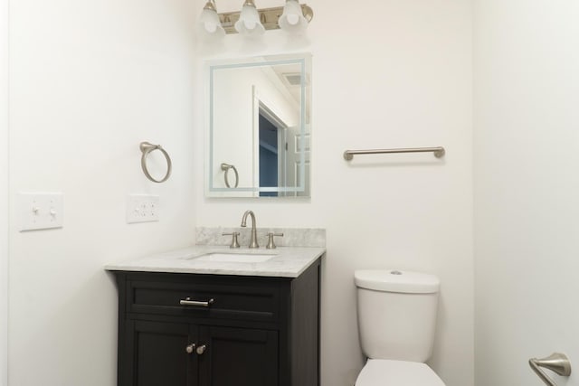 15054 E 2500 N Rd, Hudson, IL 61748 - half bathroom featuring vanity and toilet