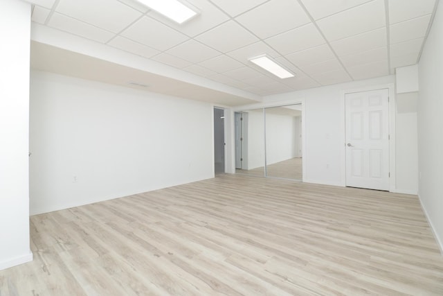 15054 E 2500 N Rd, Hudson, IL 61748 - spare room featuring light wood-style floors and a paneled ceiling