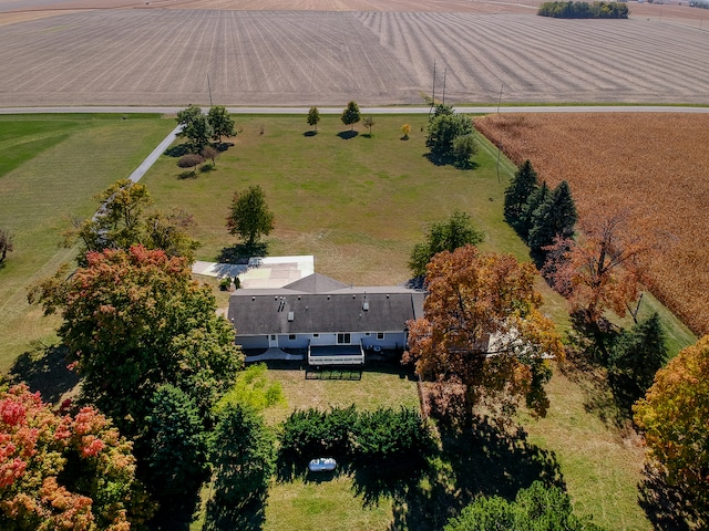 birds eye view of property with a rural view