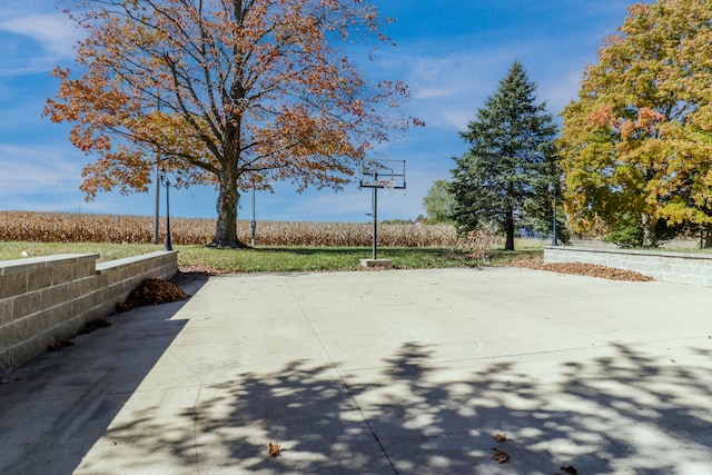 view of patio featuring basketball court