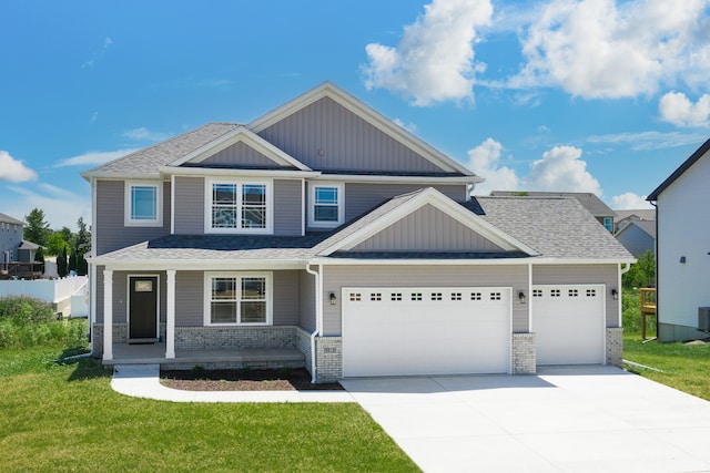 craftsman inspired home with a porch, central AC, a garage, and a front lawn