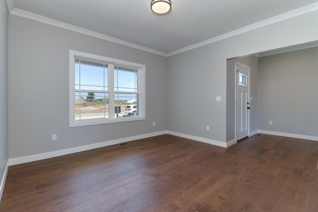 unfurnished room featuring crown molding and dark hardwood / wood-style flooring