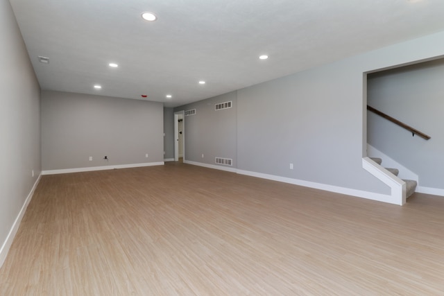 unfurnished room featuring light hardwood / wood-style floors