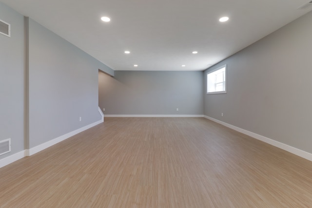 unfurnished room featuring light hardwood / wood-style flooring