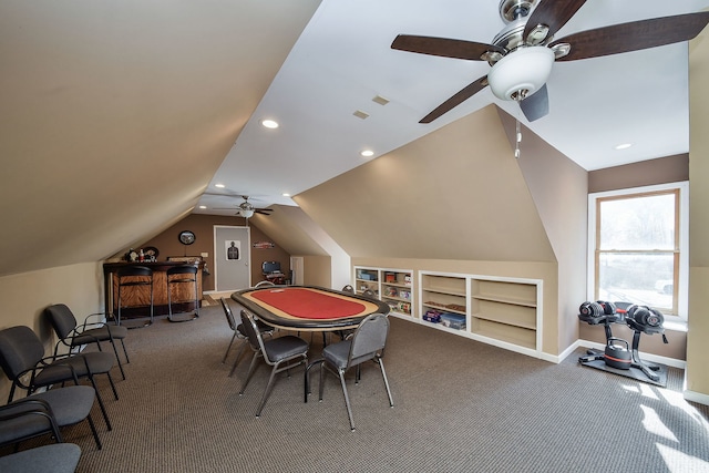 playroom with ceiling fan, built in features, carpet flooring, and lofted ceiling